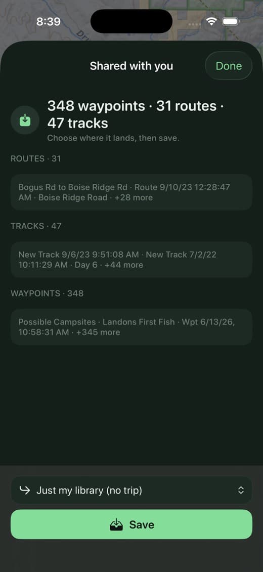 Second Kick Maps import review sheet bringing in a whole library from one file — 348 waypoints, 31 routes and 47 tracks — with a chooser for whether it lands in a trip or the library